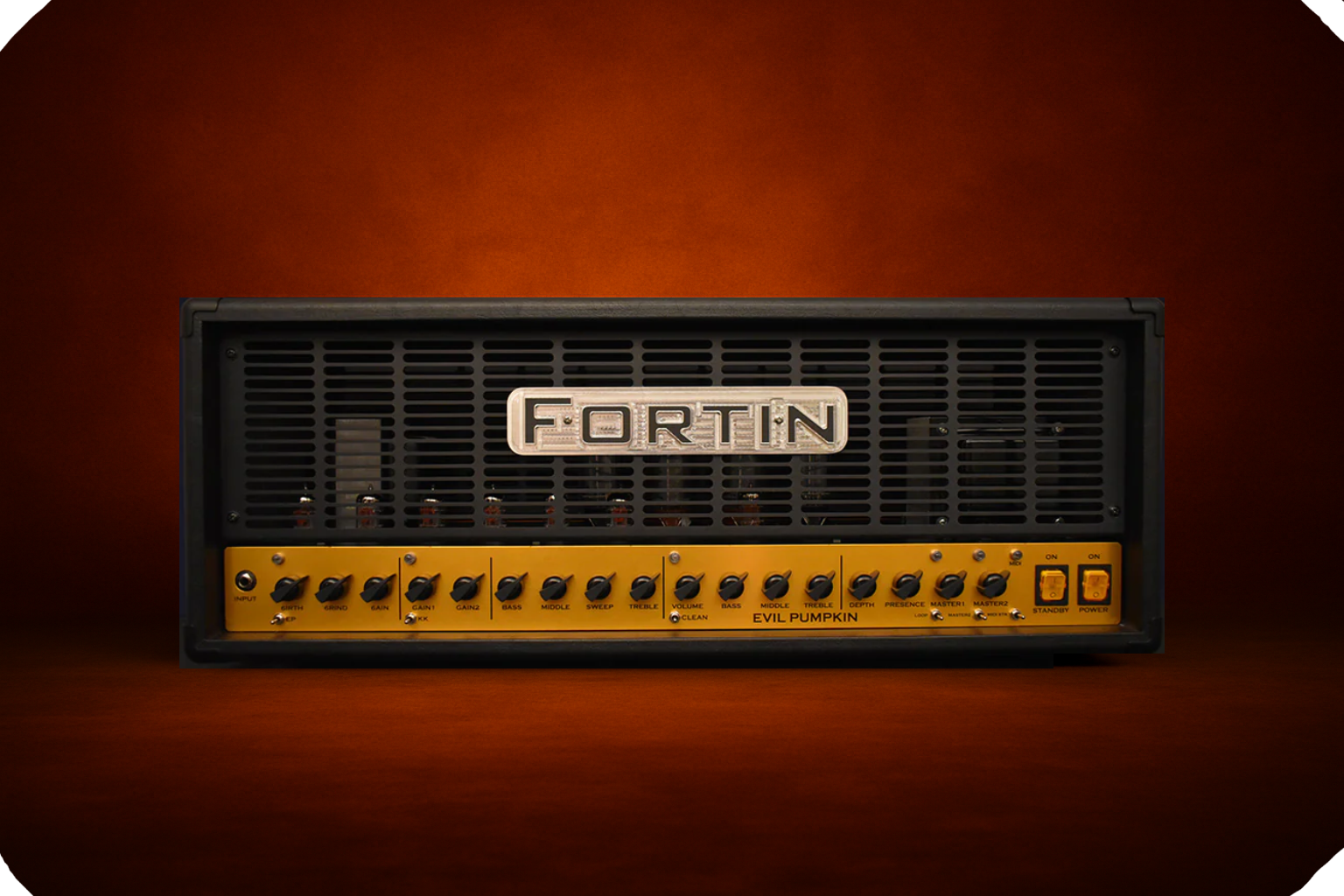 Fortin Evil Pumpkin guitar amplifier head on forge-style background, limited 2023 release with only 75 units made, high-gain amp used at Reamp Forge.