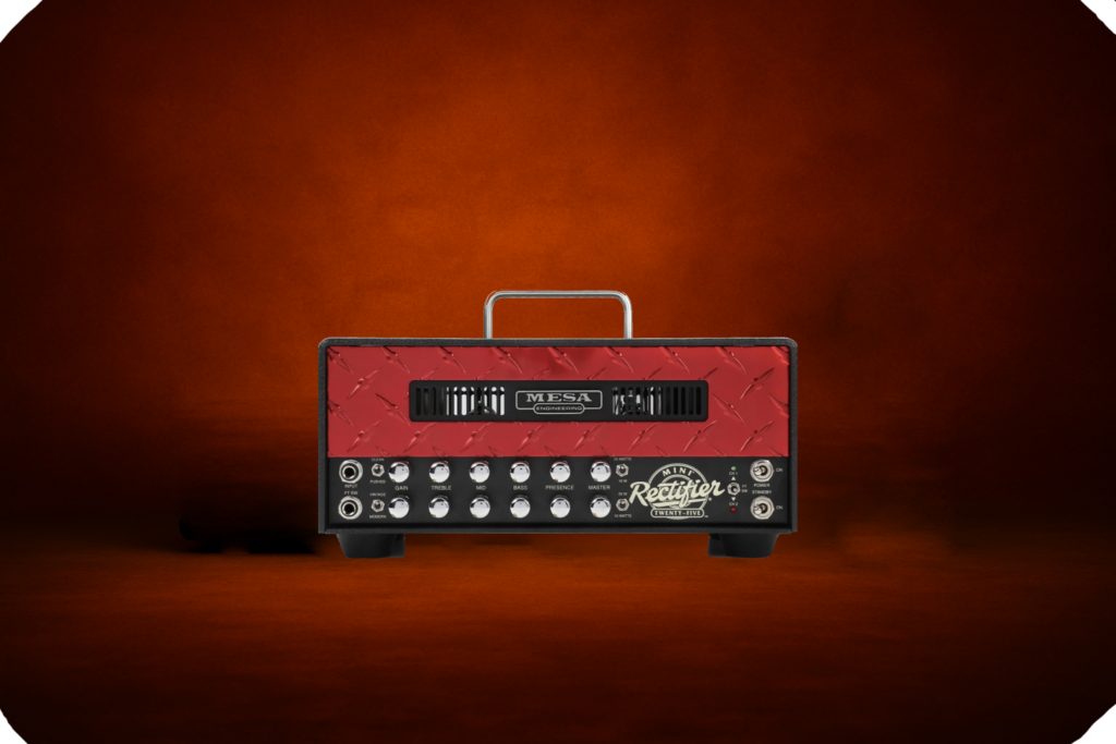 Mesa Boogie Mini Rectifier guitar amplifier head on dark forge-style background. High-gain amp used for reamping at Reamp Forge.