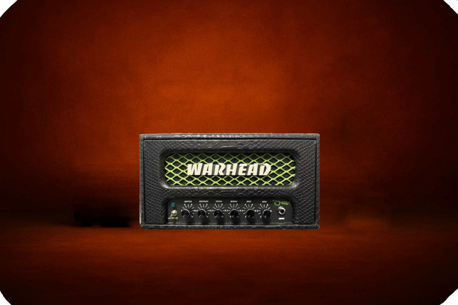 Warhead Mini guitar amplifier head on dark forge-style background, limited edition 2024 release, high-gain amp used for reamping at Reamp Forge.